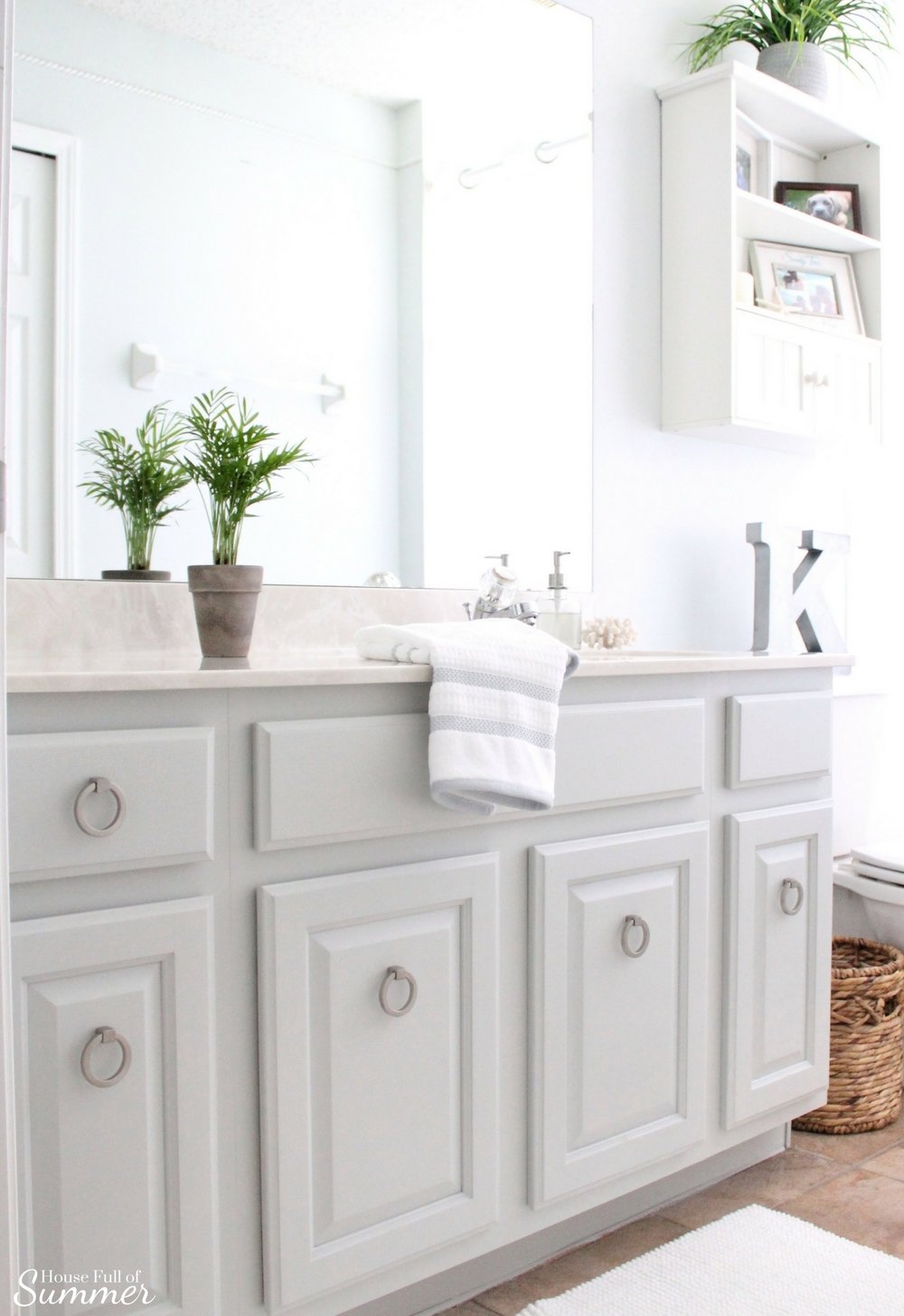 easy bathroom cabinet transformation — house full of summer