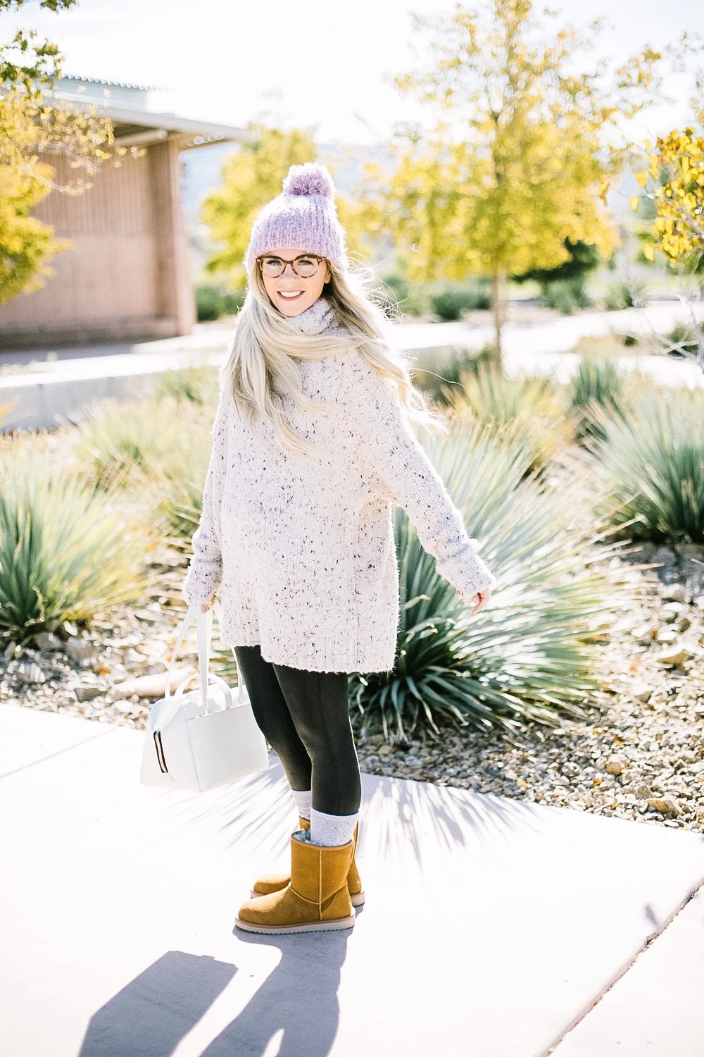 Holiday Shoe Gift Ideas with Kohls featured by top Las Vegas fashion blog, Life of a Sister: image of a woman wearing Koolaburras