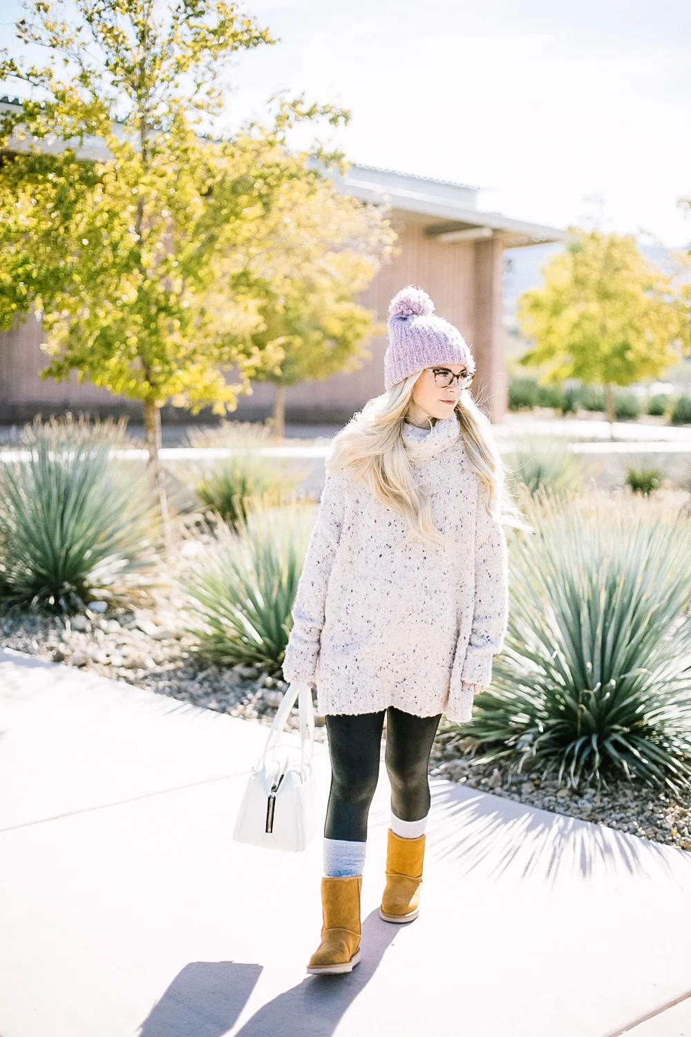Holiday Shoe Gift Ideas with Kohls featured by top Las Vegas fashion blog, Life of a Sister: image of a woman wearing Koolaburras