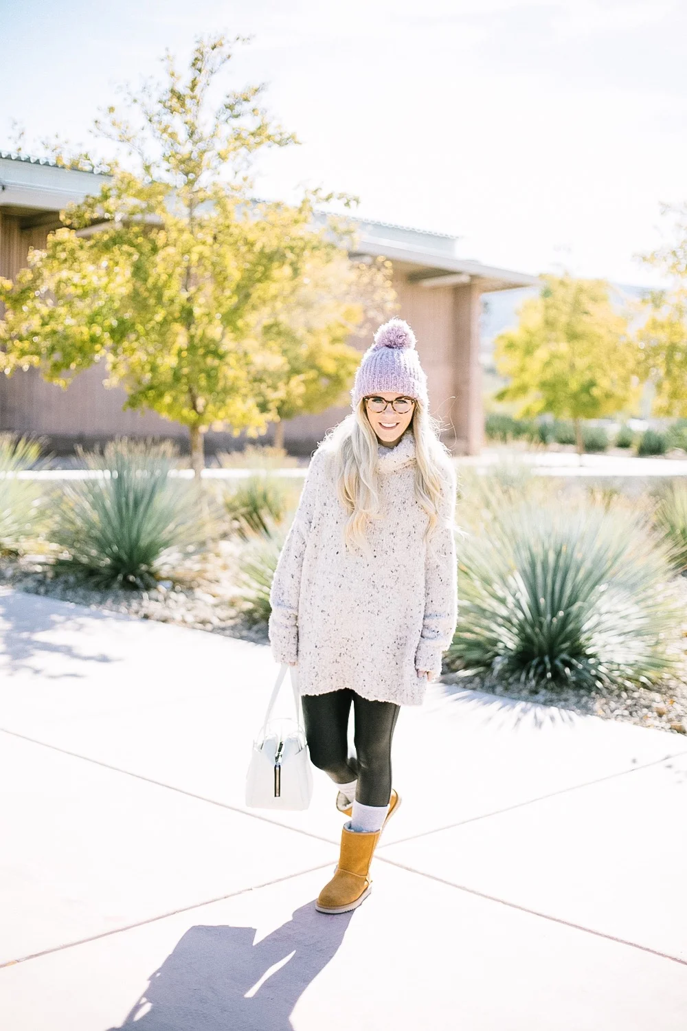 Holiday Shoe Gift Ideas with Kohls featured by top Las Vegas fashion blog, Life of a Sister: image of a woman wearing Koolaburras