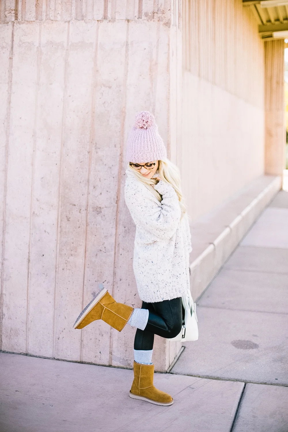 Holiday Shoe Gift Ideas with Kohls featured by top Las Vegas fashion blog, Life of a Sister: image of a woman wearing Koolaburras