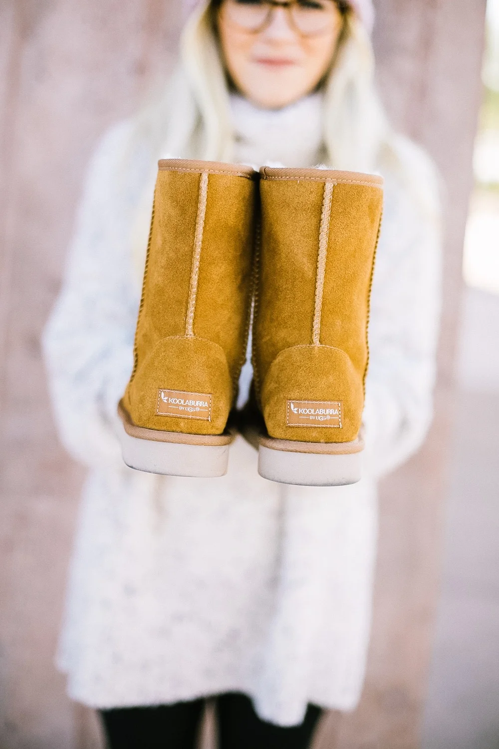 Holiday Shoe Gift Ideas with Kohls featured by top Las Vegas fashion blog, Life of a Sister: image of a woman wearing Koolaburras