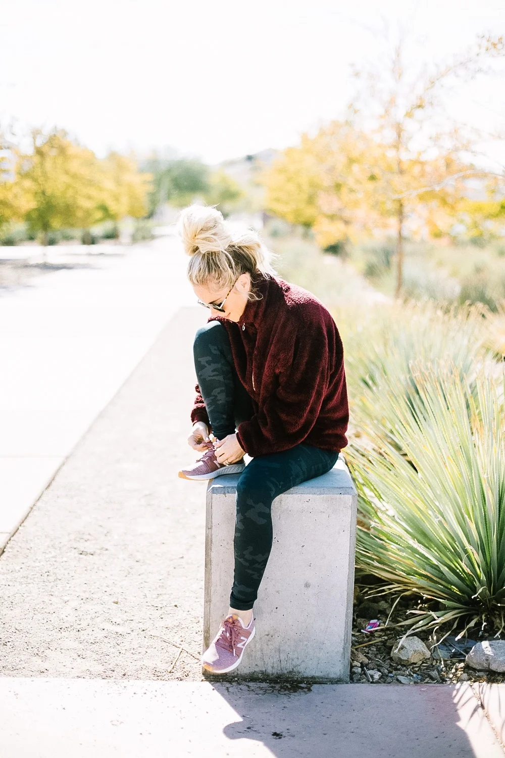 Holiday Shoe Gift Ideas with Kohls featured by top Las Vegas fashion blog, Life of a Sister: image of a woman wearing New Balance Fresh Foam Sneakers