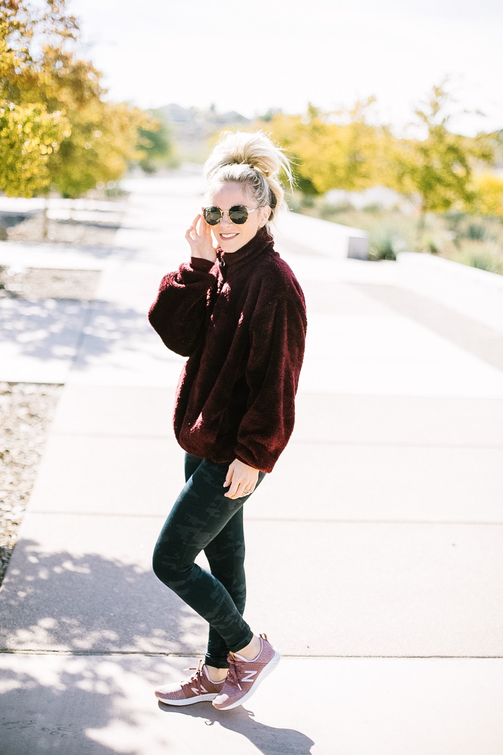 Holiday Shoe Gift Ideas with Kohls featured by top Las Vegas fashion blog, Life of a Sister: image of a woman wearing New Balance Fresh Foam Sneakers