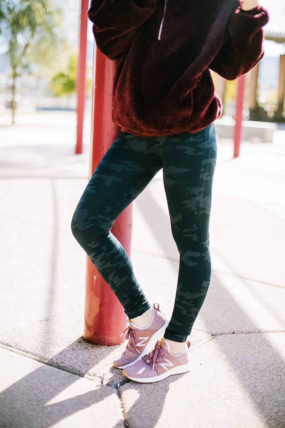 Holiday Shoe Gift Ideas with Kohls featured by top Las Vegas fashion blog, Life of a Sister: image of a woman wearing New Balance Fresh Foam Sneakers