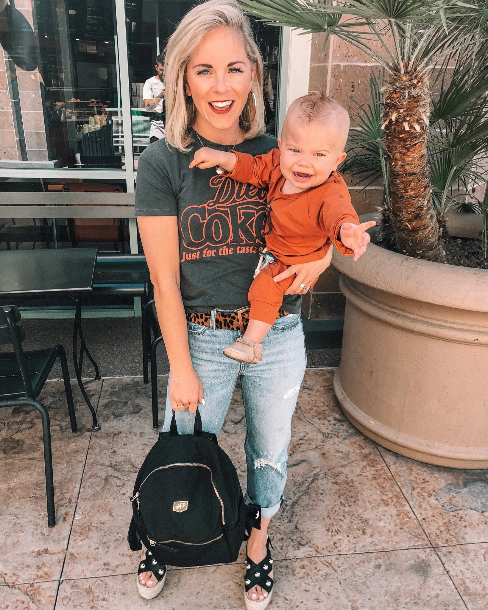 Denim trend featured by top US fashion blog, Life of a Sister: image of a woman wearing Levi’s Wedgie Straight Jeans