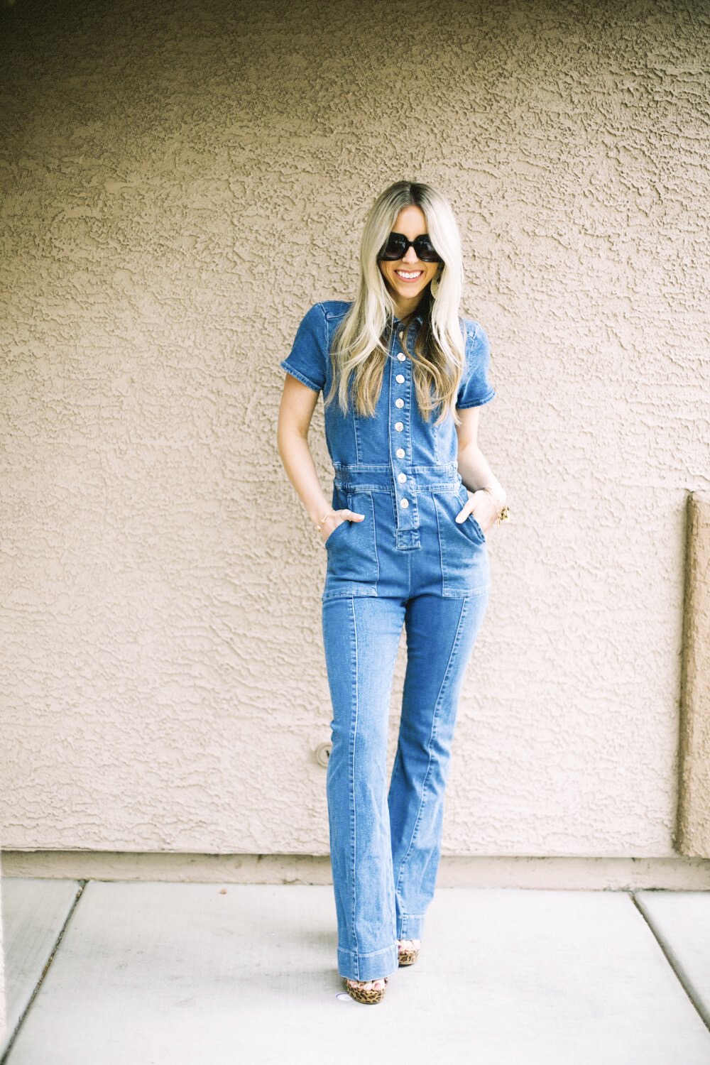 Denim trend featured by top US fashion blog, Life of a Sister: image of a woman wearing a BDG jumpsuit