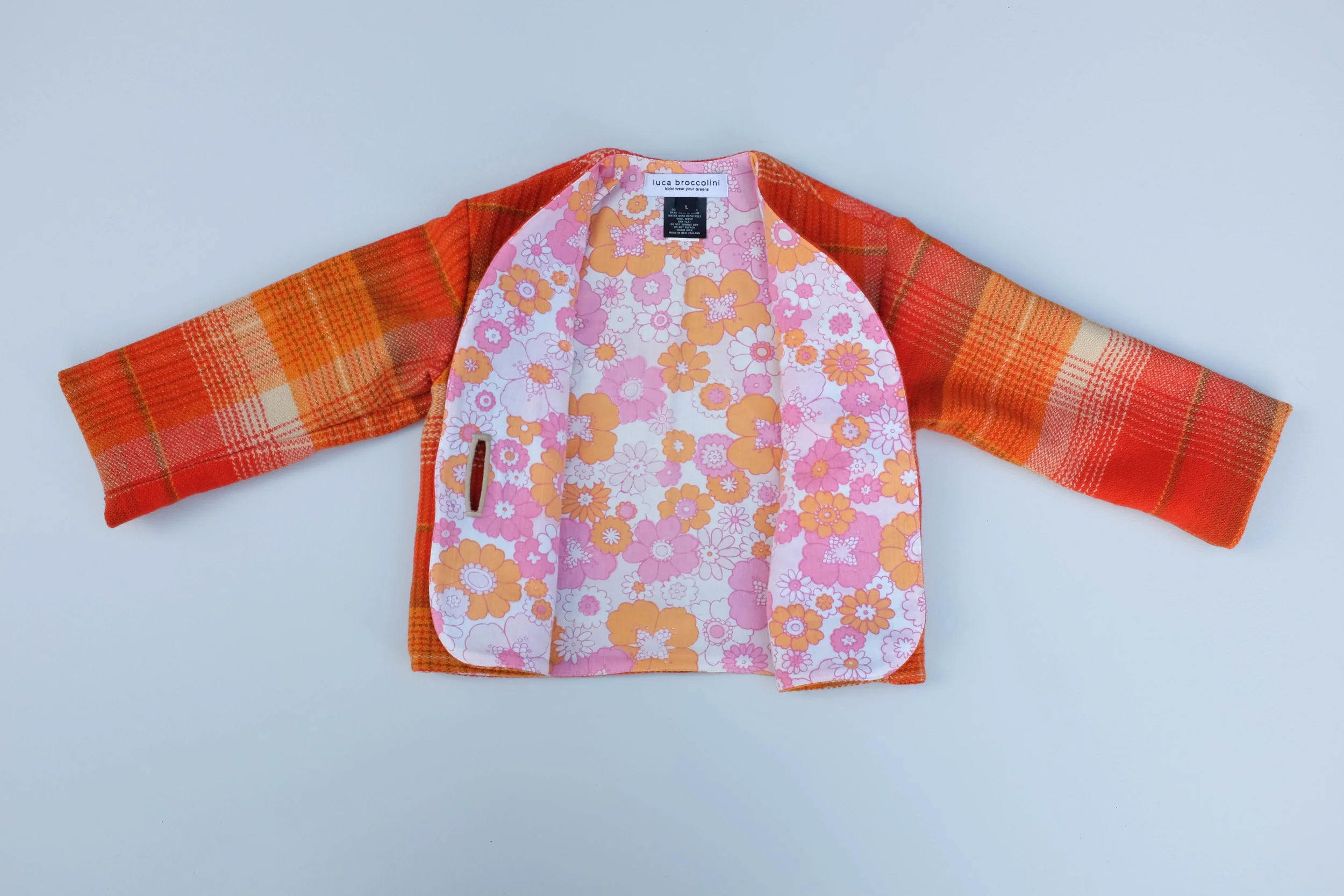 Fully lined beautiful unisex kids winter jacket in vintage wool with hand turned button by eco brand luca broccolini.jpg