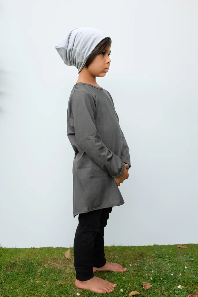 Boy in merino oversized Tshirt by sustainable slow fashion brand luca broccolini.jpg