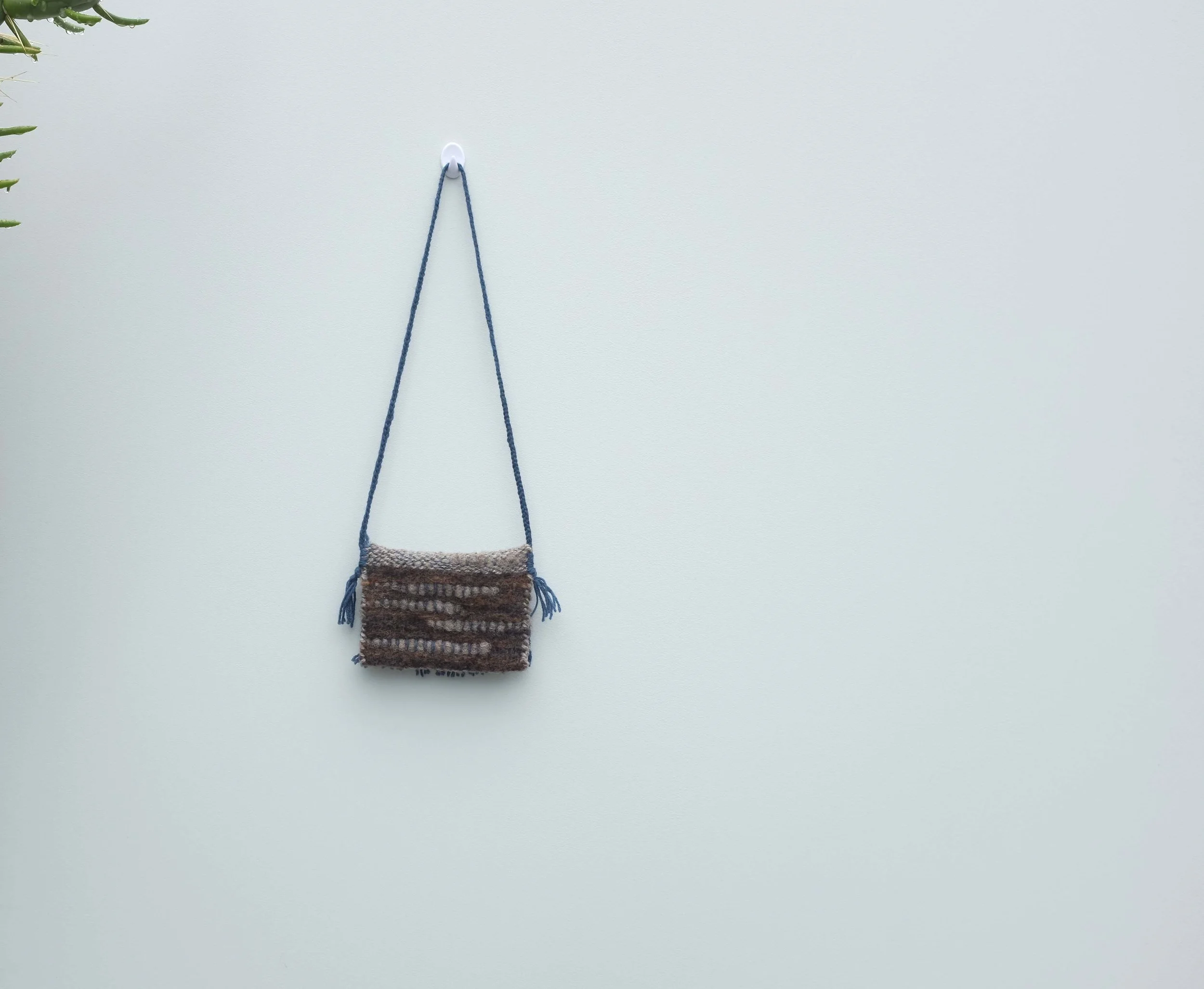 Hand woven slaughter free blue and brown wool bag by new zealnd made sustainable slow fashion unisex kids brand luca broccolini..jpg