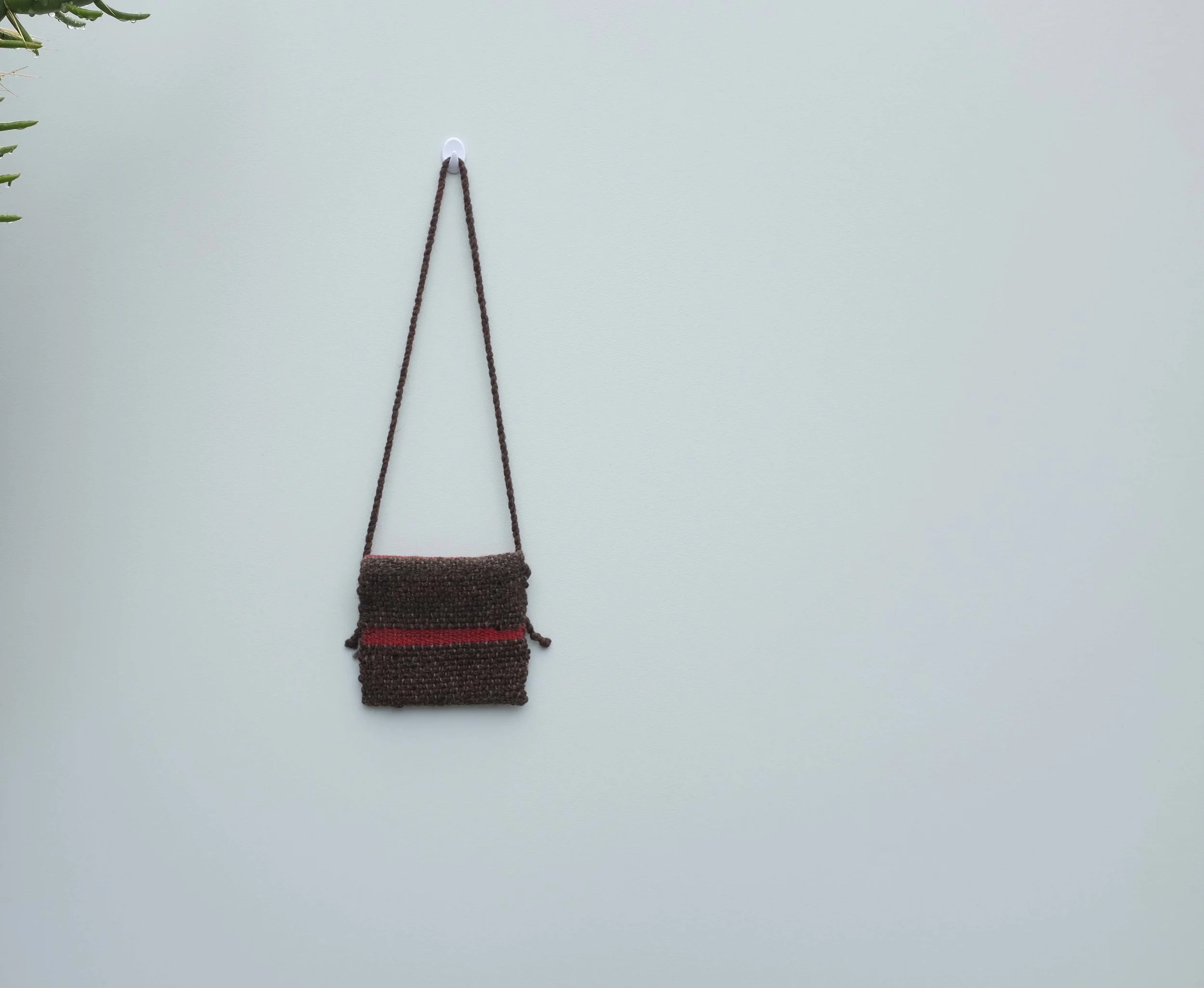 Hand woven slaughter-free wool bag by new zealnd made sustainable slow fashion brand luca broccolini..jpg