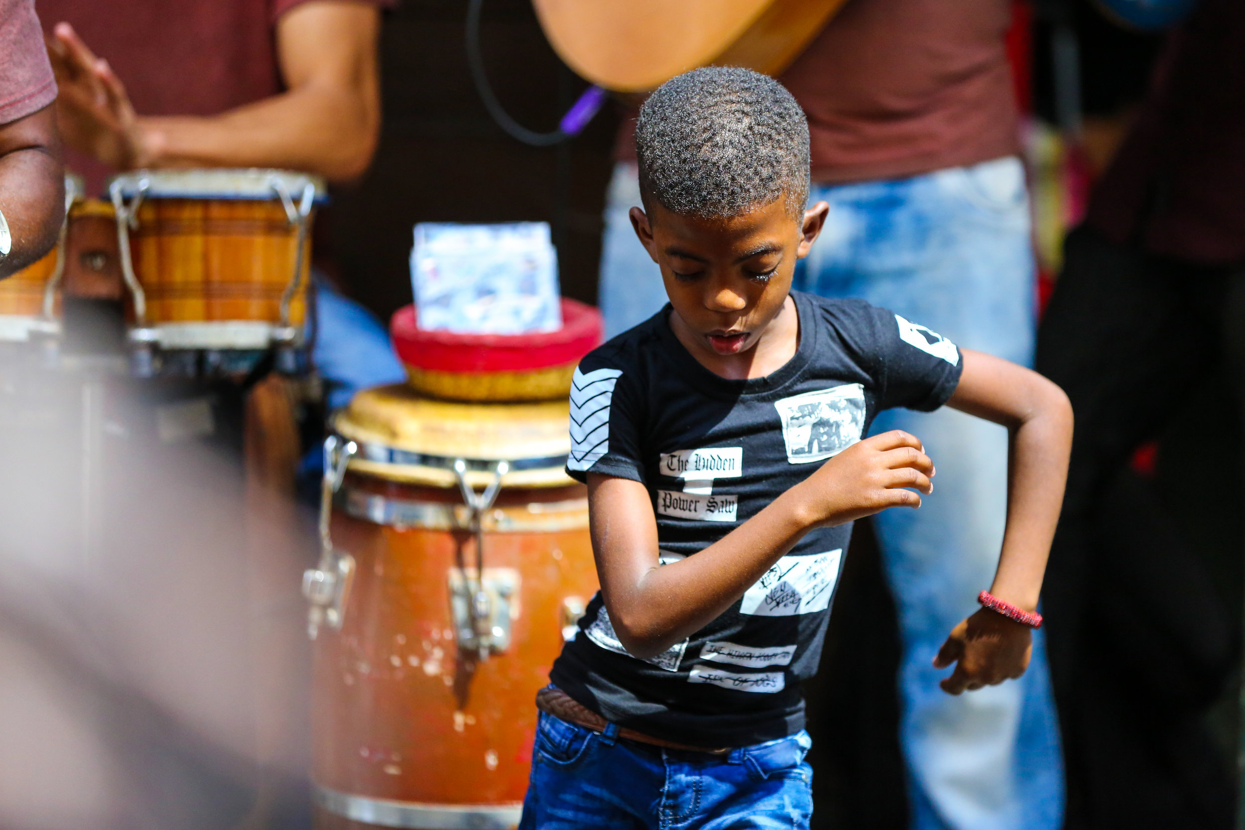 A young boy dances rumba while a band plays on the street. March 2, 2019, in Old Havana, Cuba. ( The GroundTruth Project )