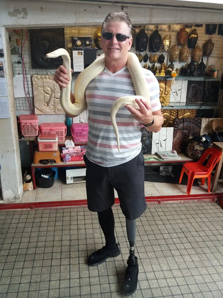 ERocktravel@gmail.com. Enjoying the incredible people in Thailand with some friends at a floating market outside of Bangkok.