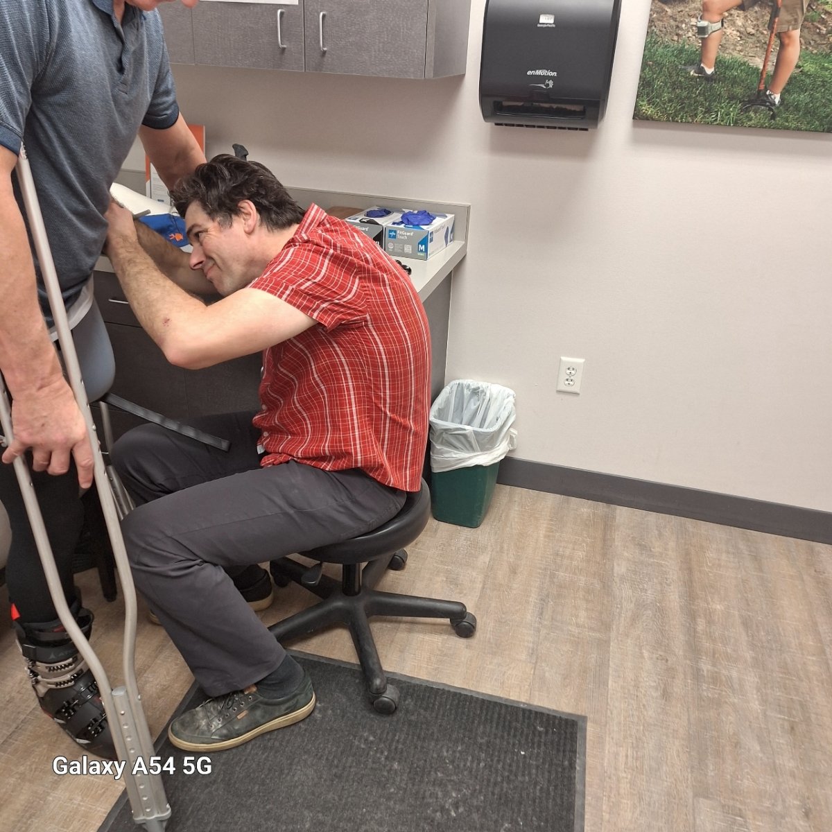 Skiing for the first time with the new prosthetic and with my son, Michael.