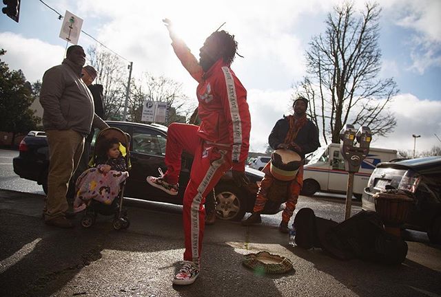 Facinet Sylla, of Eugene, dances as a Martin Luther King Jr. march winds down outside the Shedd Institute Monday, Jan. 21, 2019. | 5D III, 24-105. #mlkday #eugene #eugeneoregon #oregon #dance