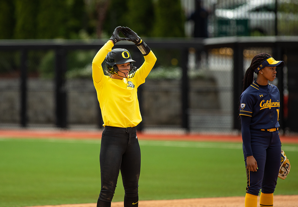  University of Oregon shortstop Jasmine Sievers makes an O-sign after hitting a double that allowed teammeate Haley Cruse to score during game three in a series against UC Berkeley Saturday, April 20, 2019, at Jane Sanders Stadium in Eugene. The Duck