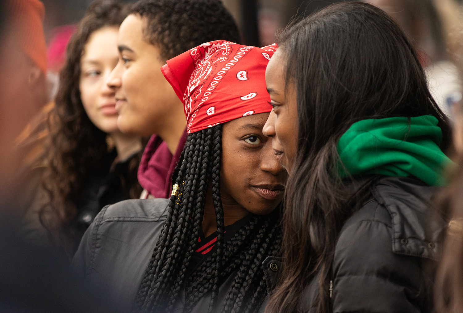  Indigo Irving, center, speaks with her twin, Isis, as University of Oregon students line up during a Martin Luther King Jr. rally outside Autzen Stadium Monday morning, Jan. 21, 2019, in Eugene. 