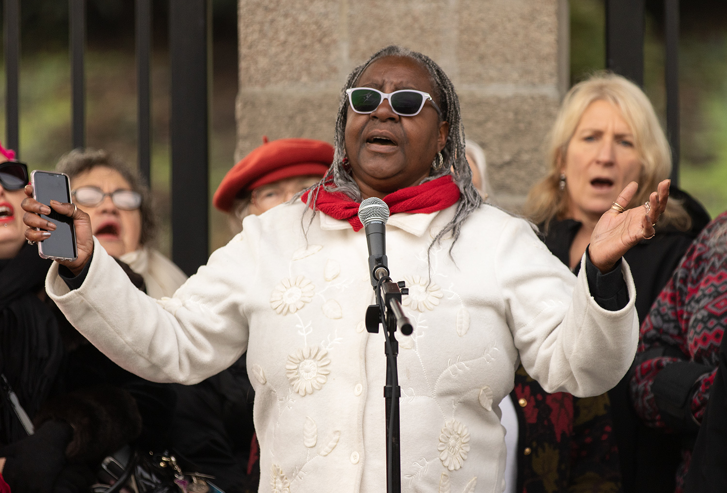  MLK 2019 Community Choir leader Kathy Vrzak leads singers through “America the Beautiful” during a Martin Luther King Jr. rally outside Autzen Stadium Monday, Jan. 21, 2019, in Eugene. 