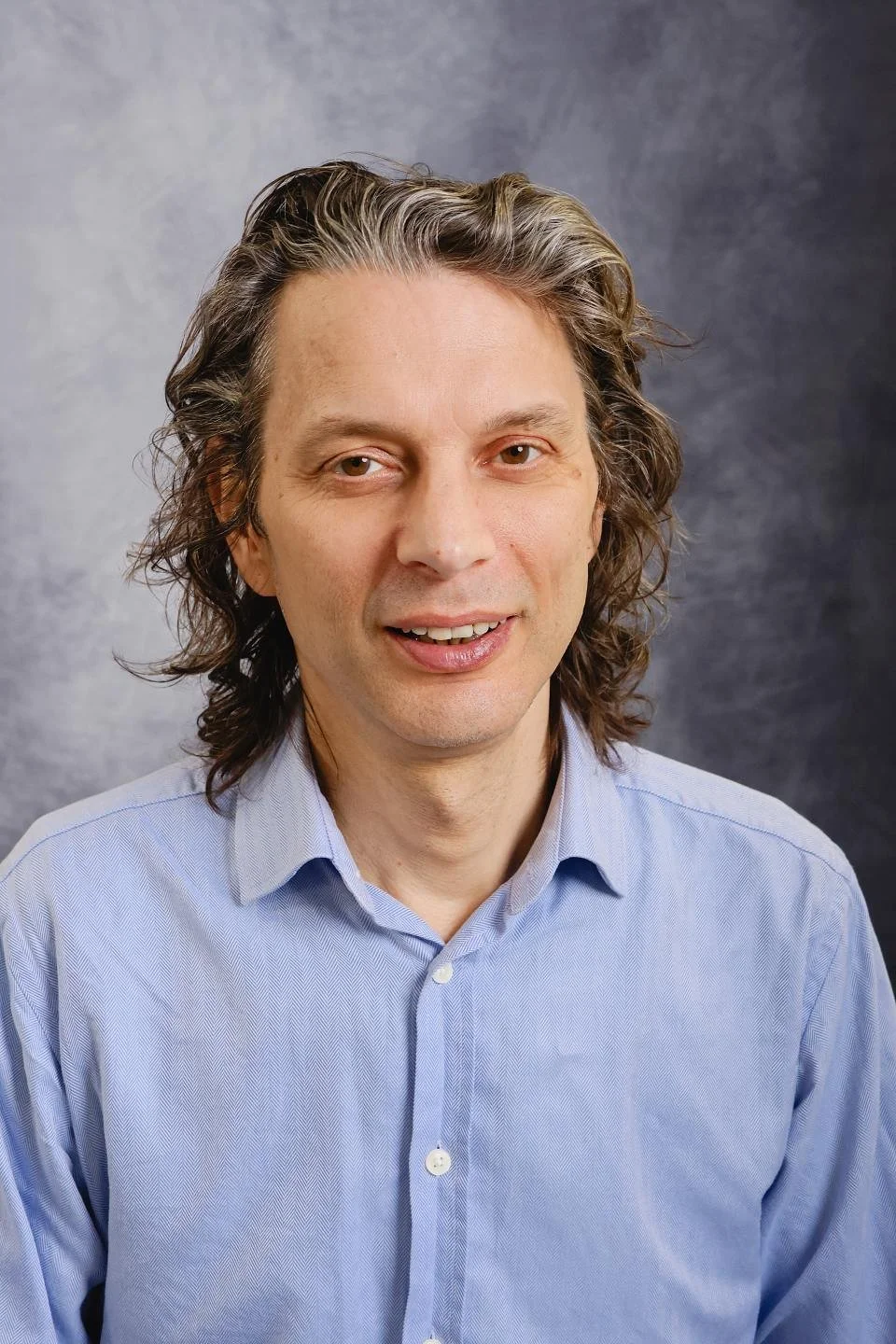 Headshot of MICHAEL ESSWOOD
