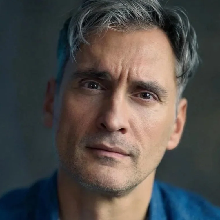 CHRISTOPHER KOUROS