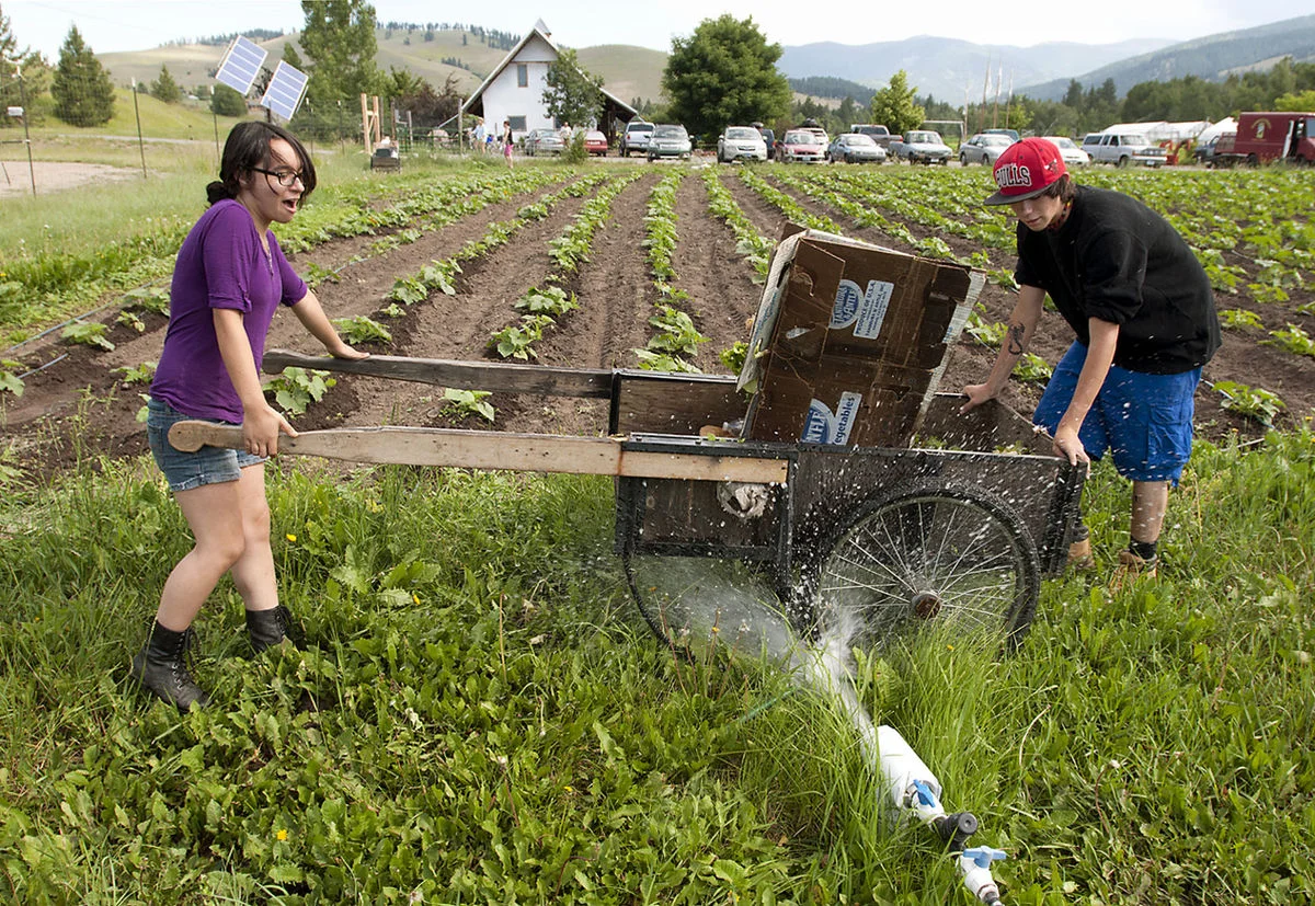 Youth Harvest crew member feeling at home, dishing up tasty food