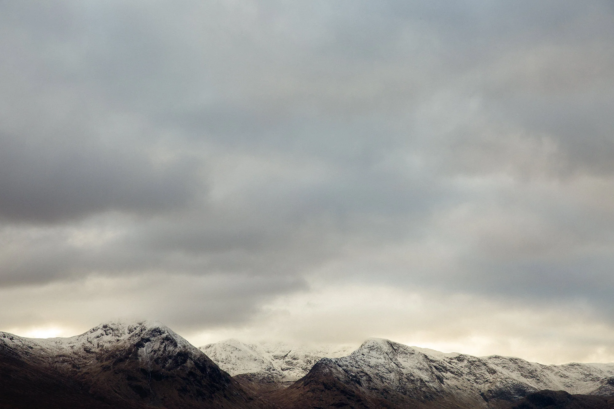 Snow topped Highland Scottish mountains, Glencoe 