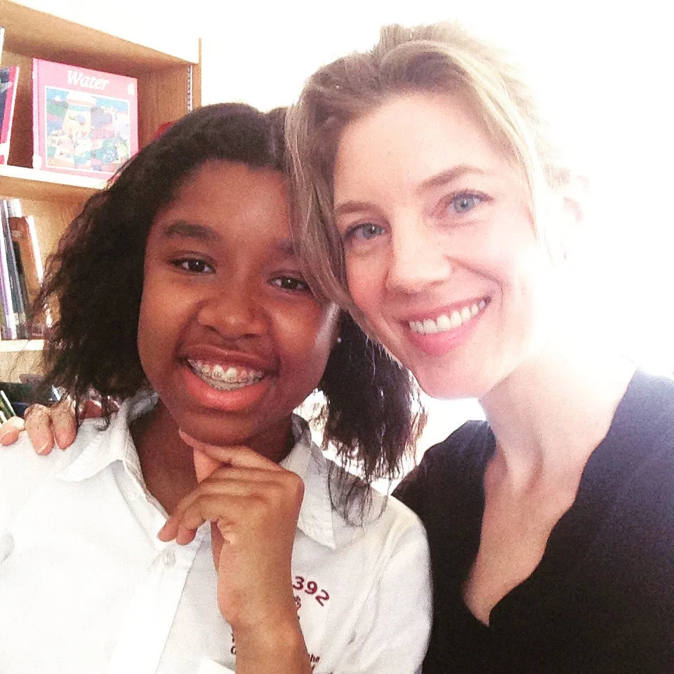 Liz Arnold with her student Nia at I.S. 392. 