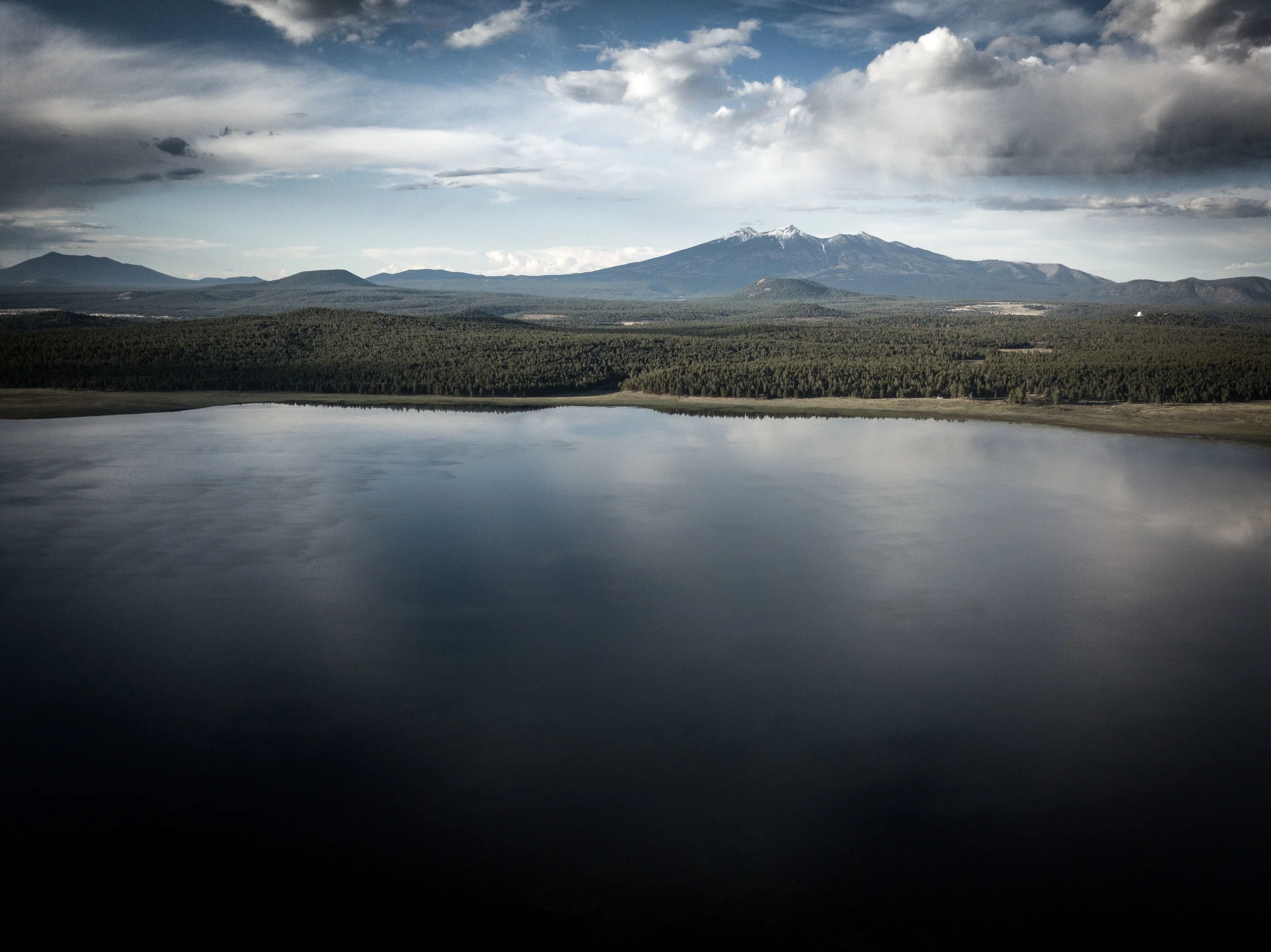 San Francisco Mountain viewed from the south across Rogers lake, an ephemeral lake out on woody mountain road.