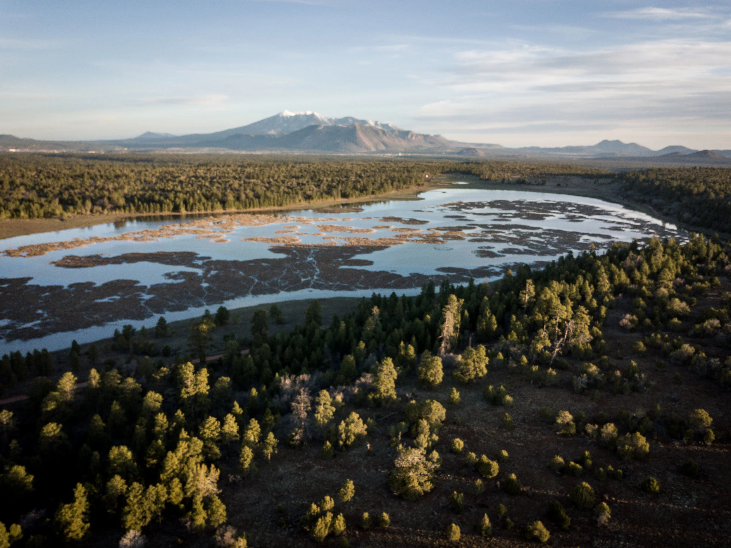 The Peaks from Marshall Lake on Anderson Mesa, lakes like Marshall fill in the winters and provide essential habitat for waterfowl and amphibians.