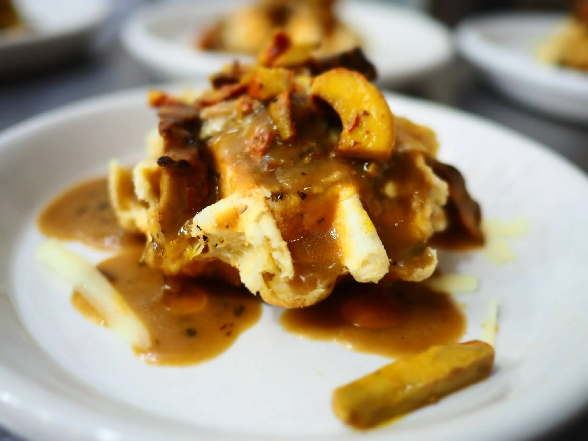 Wild mushroom rarebit on savory waffle. Photo provided by L'Etoile Du Nord.