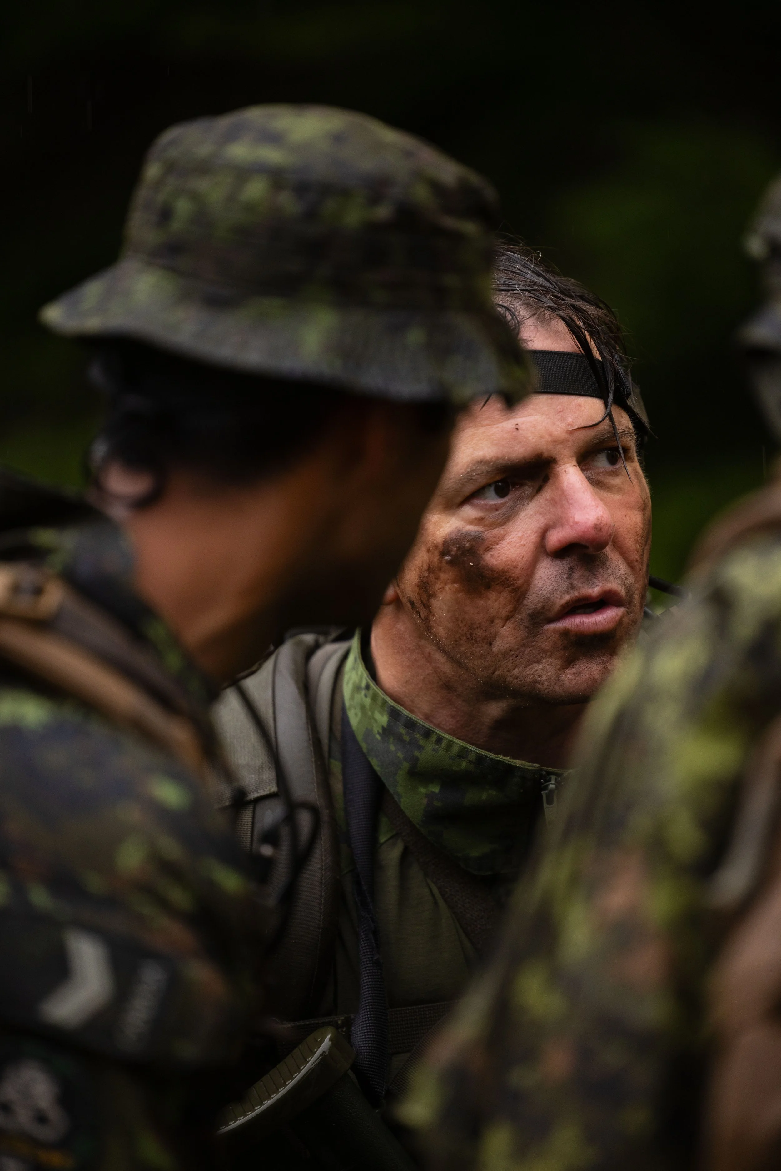  Corporal Czajkowski from the Royal Westminster Regiment planning an urban assault with team leader Master Corporal Justin Fernandes, while training for international patrol competition CAMBRIAN PATROL, outside Chilliwack, British Columbia. 23 Septem