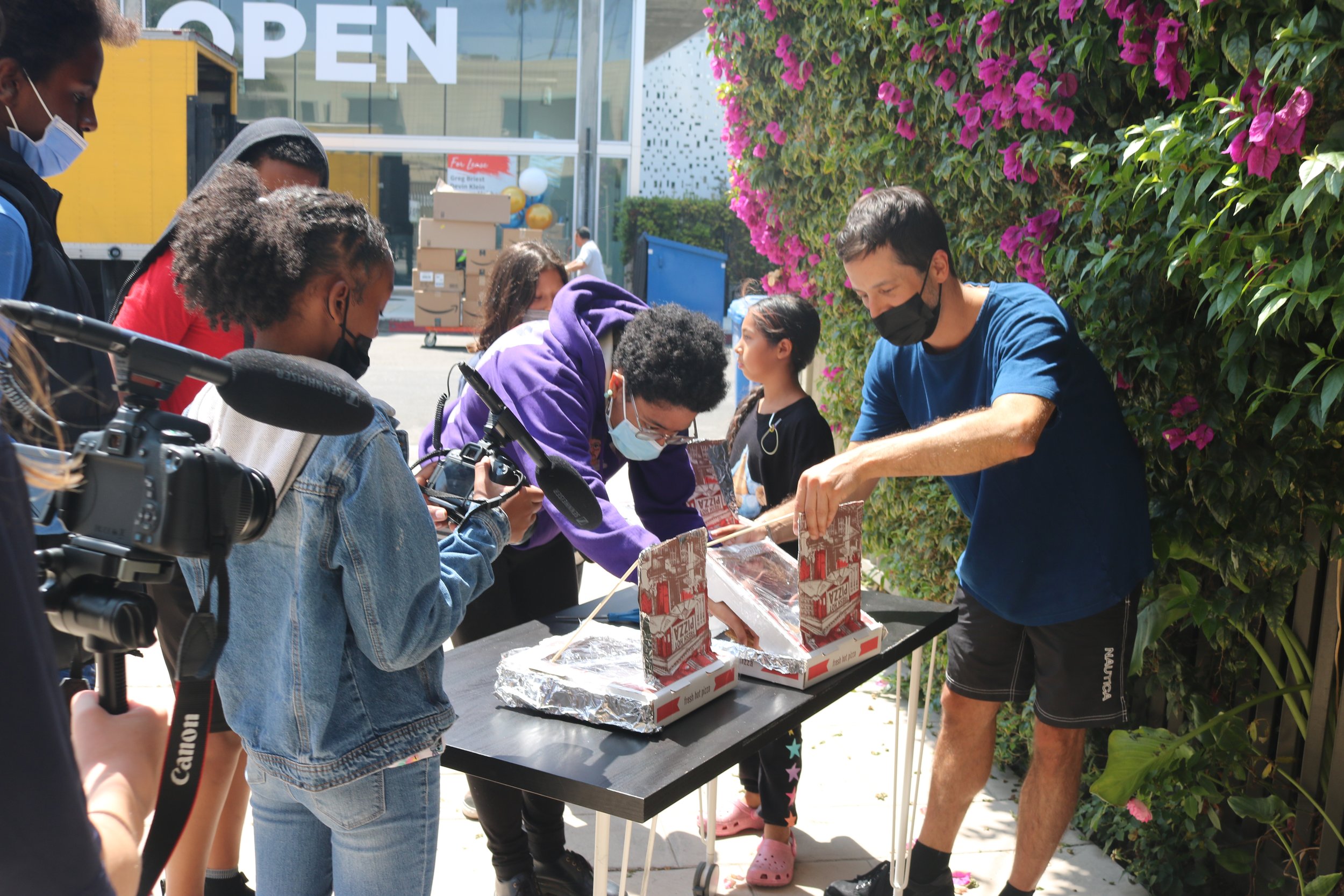  Filmmaking students capture the s’mores experiment on film. 