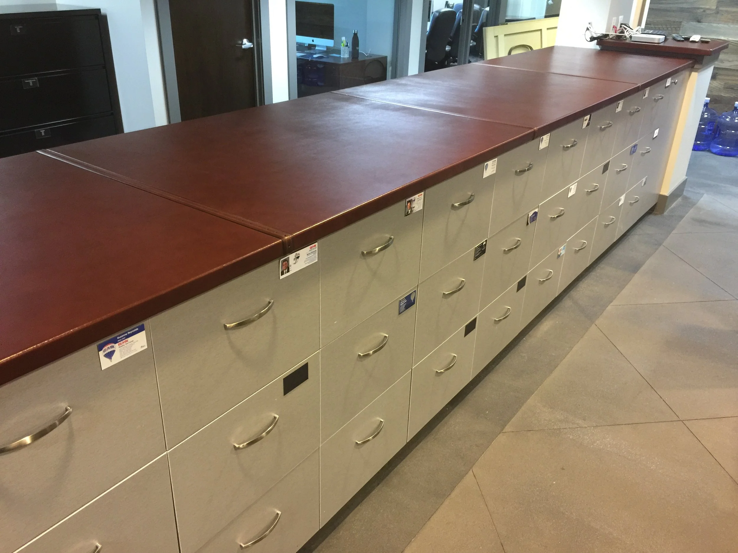Contemporary style (C) 20" countertop with belt inlay in a commercial office over filing cabinets