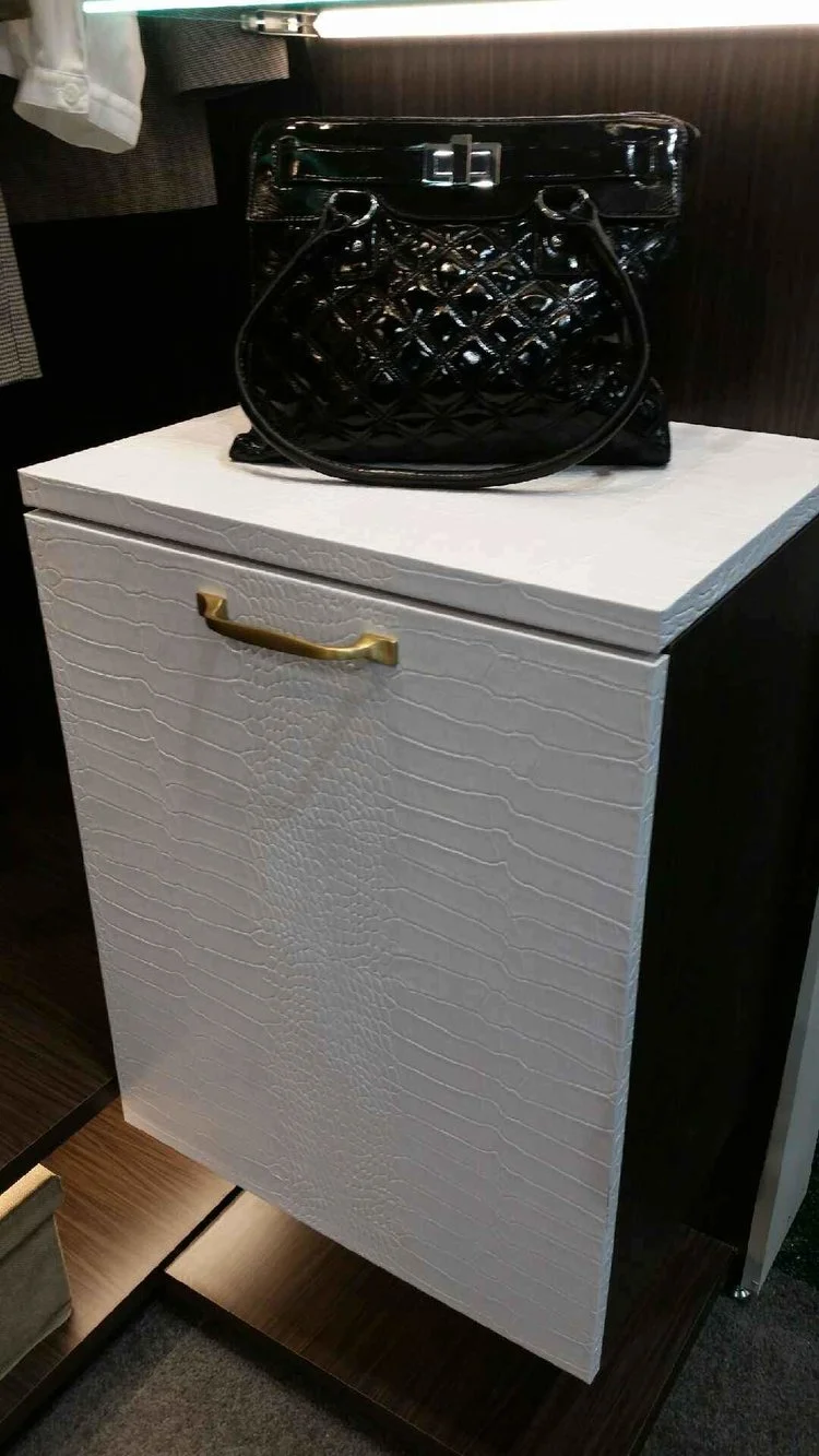 Custom Bianco Crocodile used in a closet sequence matched with an EcoDomo Infinity Leather Door of the same leather - dECOLeather Recycled Leather Veneer by Formica Group