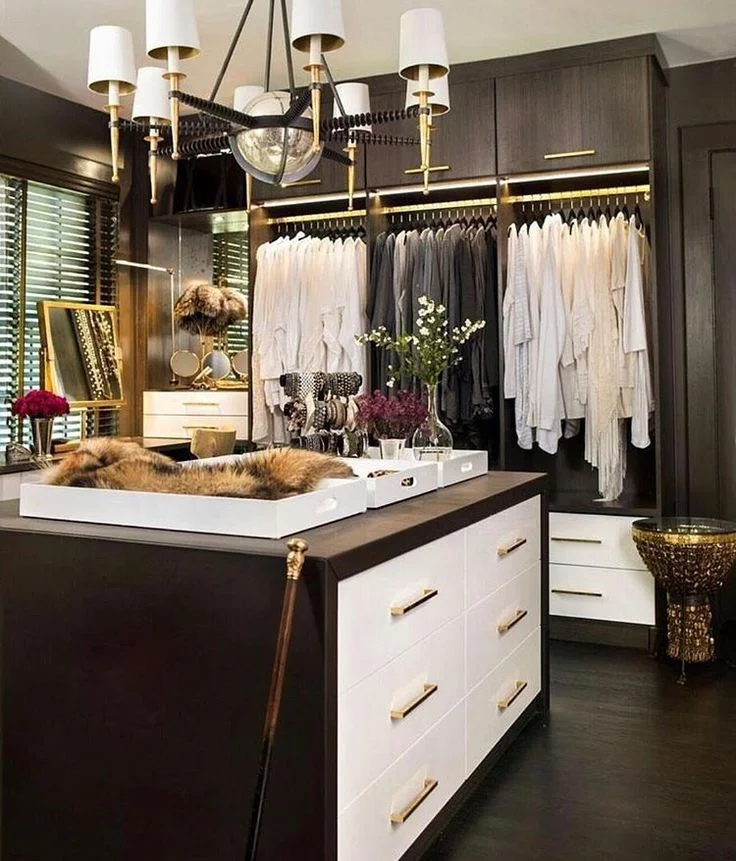 Custom Mink 2-1/8" countertop with a waterfall edge featured in the Veranda Magazine. Three tops were used to wrap the entire island on all sides. 