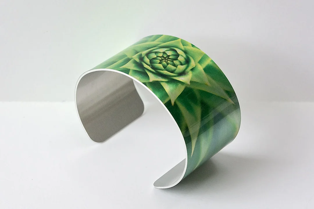 Monkey Puzzle Brushed Metal Bracelet Side.jpg