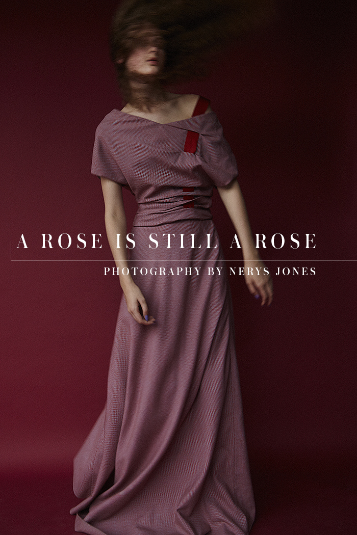 Erin wears pink and red asymmetric dress by Vionnet