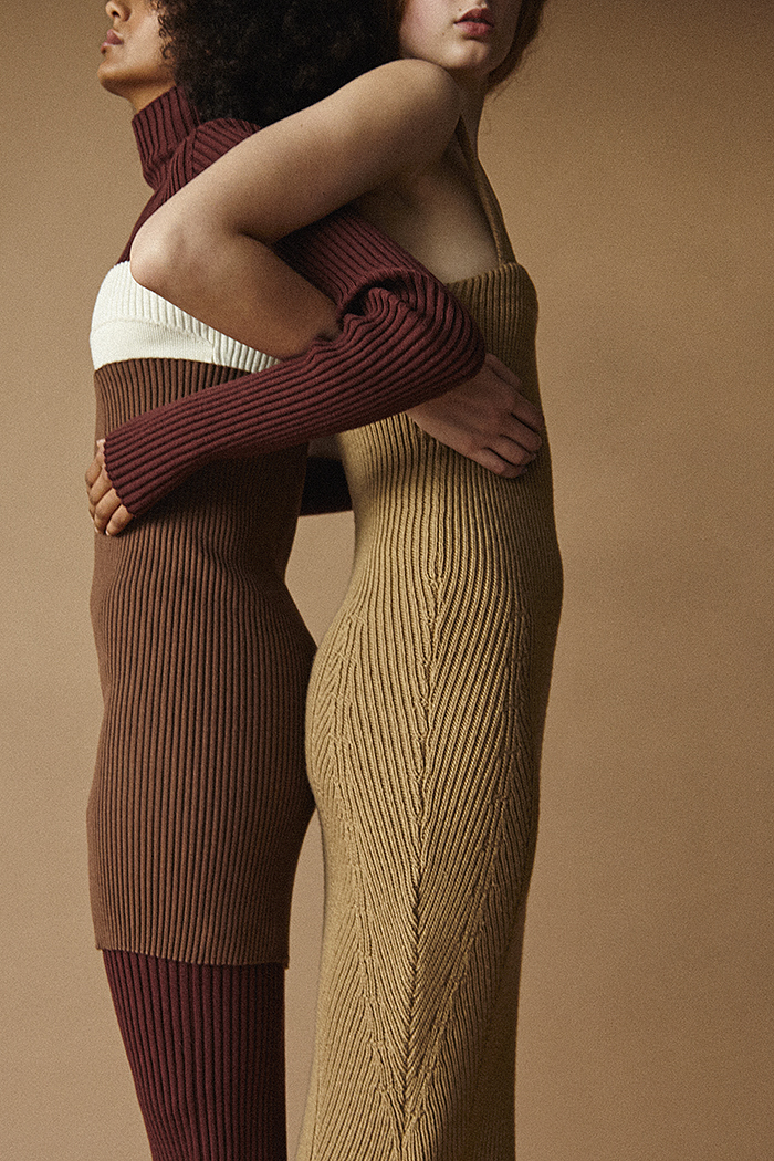 Nadia (left) wears column roll neck layered dress with cream bustier Victoria Beckham. Erin (right) wears caramel tube dress by Emilia Wickstead