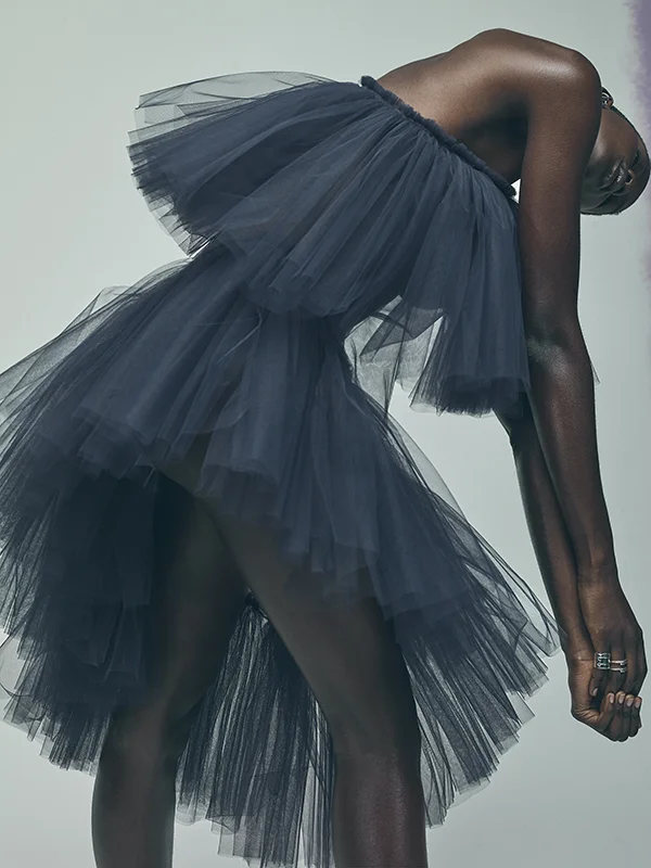 Toulle dress by Molly Goddard , black briefs by Bodas , earrings and rings by Zohra Rahman