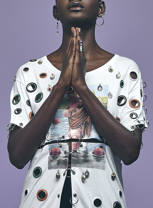 Leather shirt and cotton t-shirt by Christopher Kane, gold earrings Jessie Harris, and silver rings by Zohra Rahman