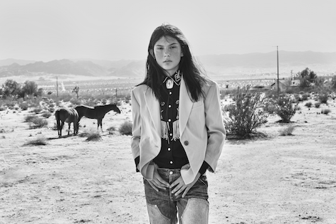 Shirt and bolo tie: Jessie Western / Jacket: Vivienne Westwood / Jeans: Givenchy by Riccardo Tisci