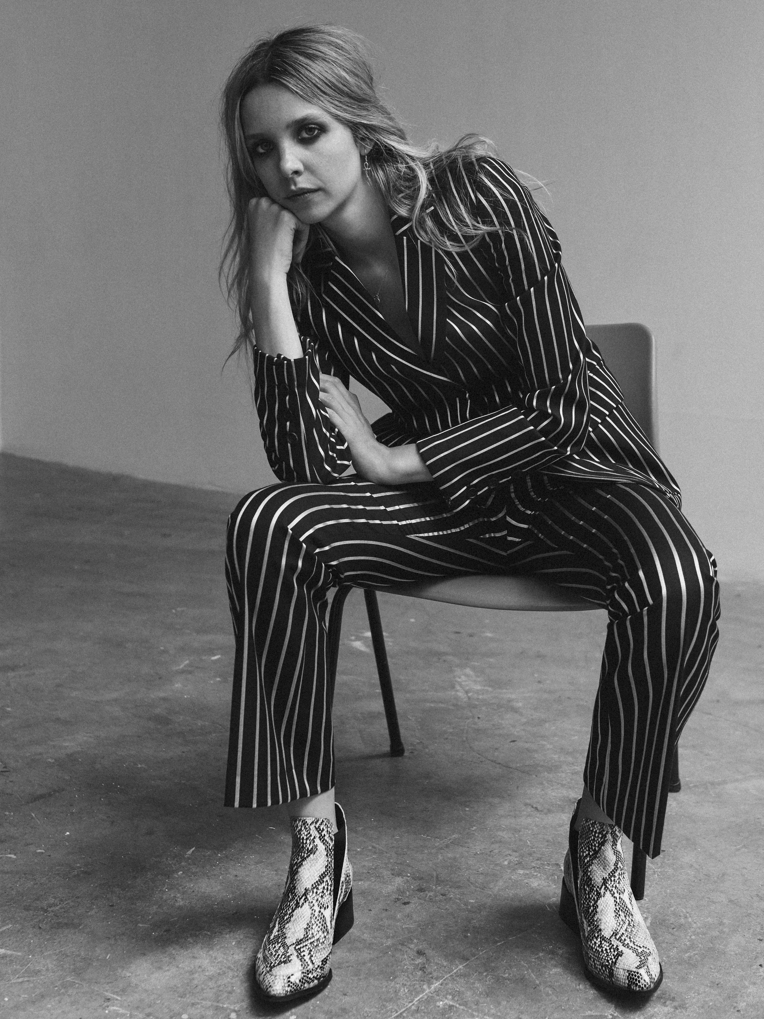 Suit by Paul and Joe, boots by Sol Sana