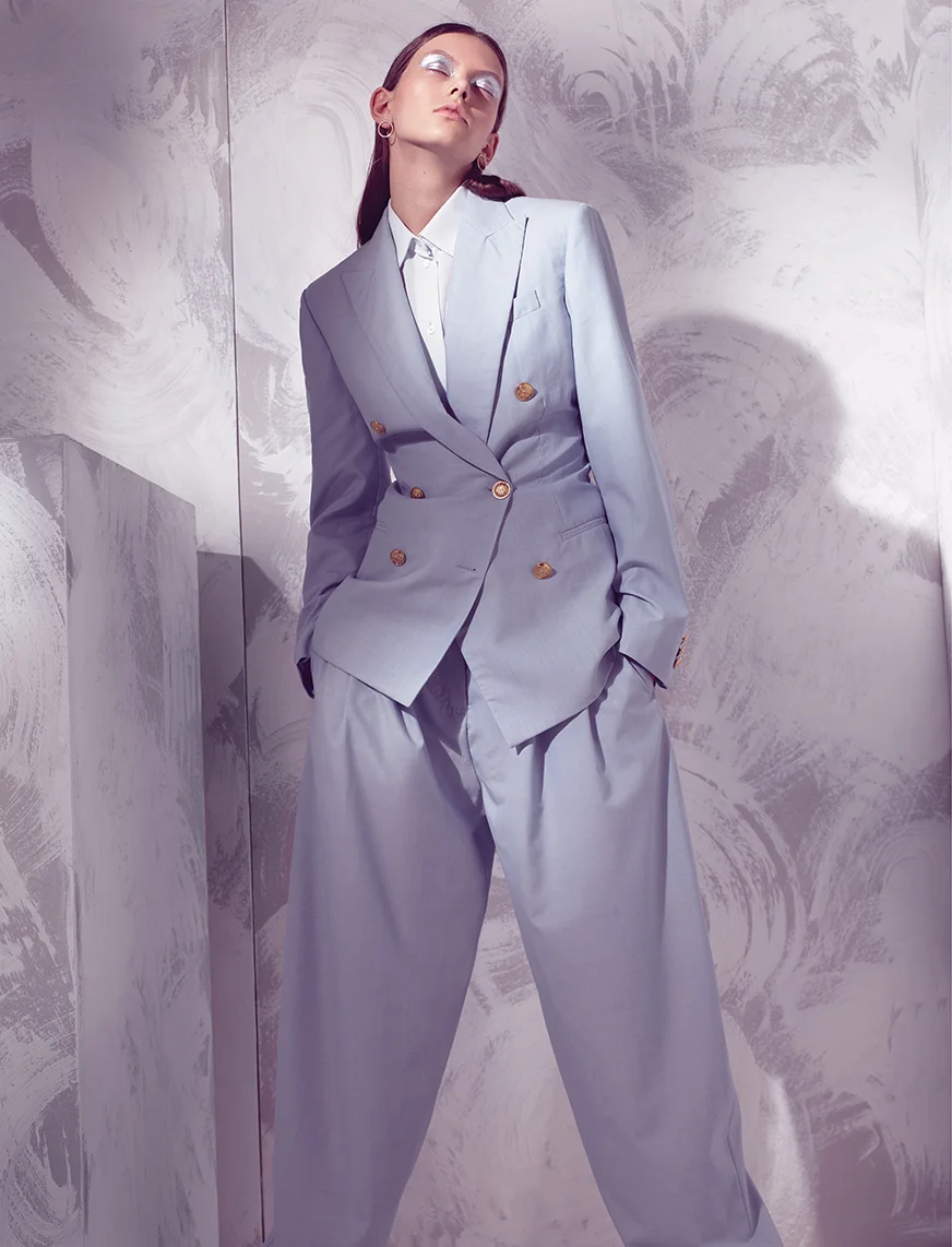 Trousers, jacket and shirt: Céline , Gold hoop earrings: Maria Black