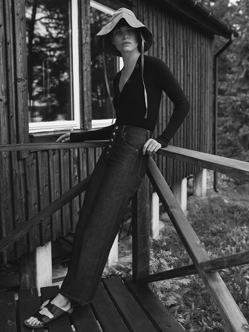 Knitted body: Khiate @ matchesfashion.com / Jeans: Eve Denim @ matchesfashion.com / Sandals: Birkenstock / Hat: stylist’s own