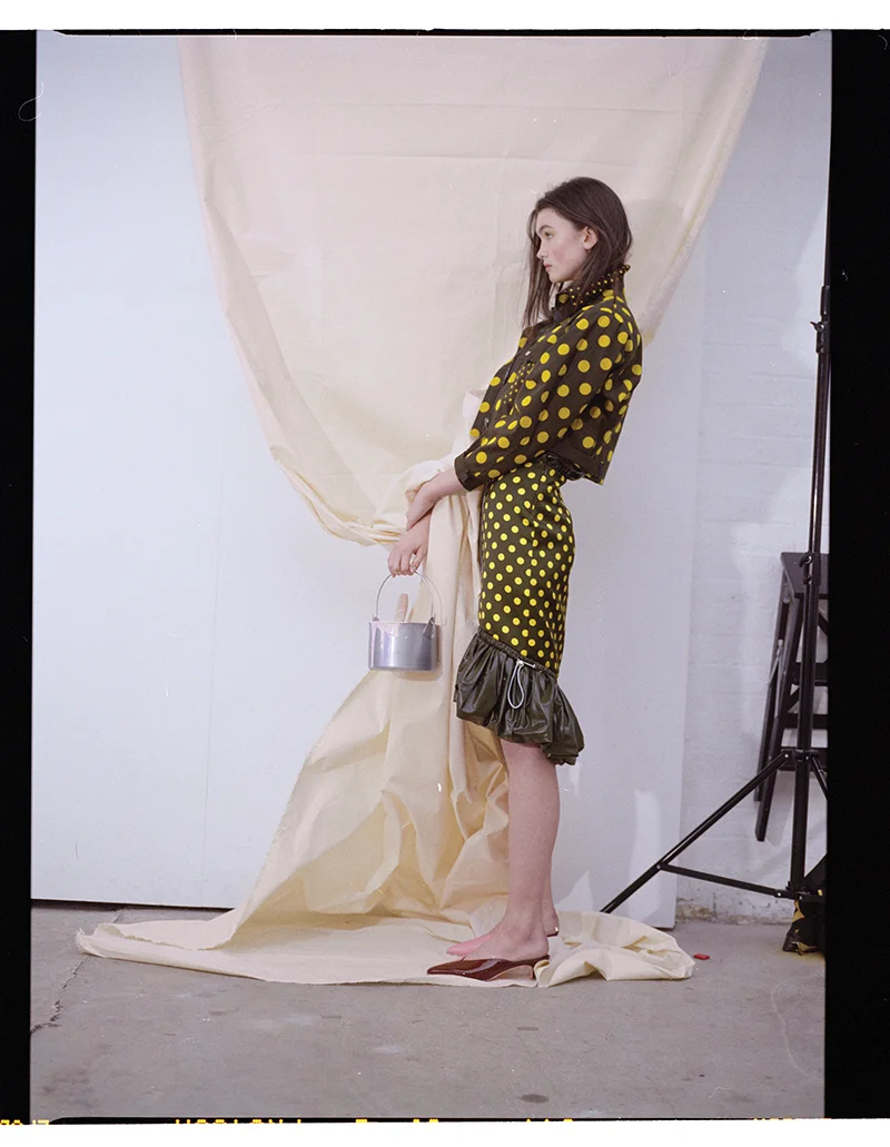Top, jacket and skirt: Tory Burch / Shoes: Tibi