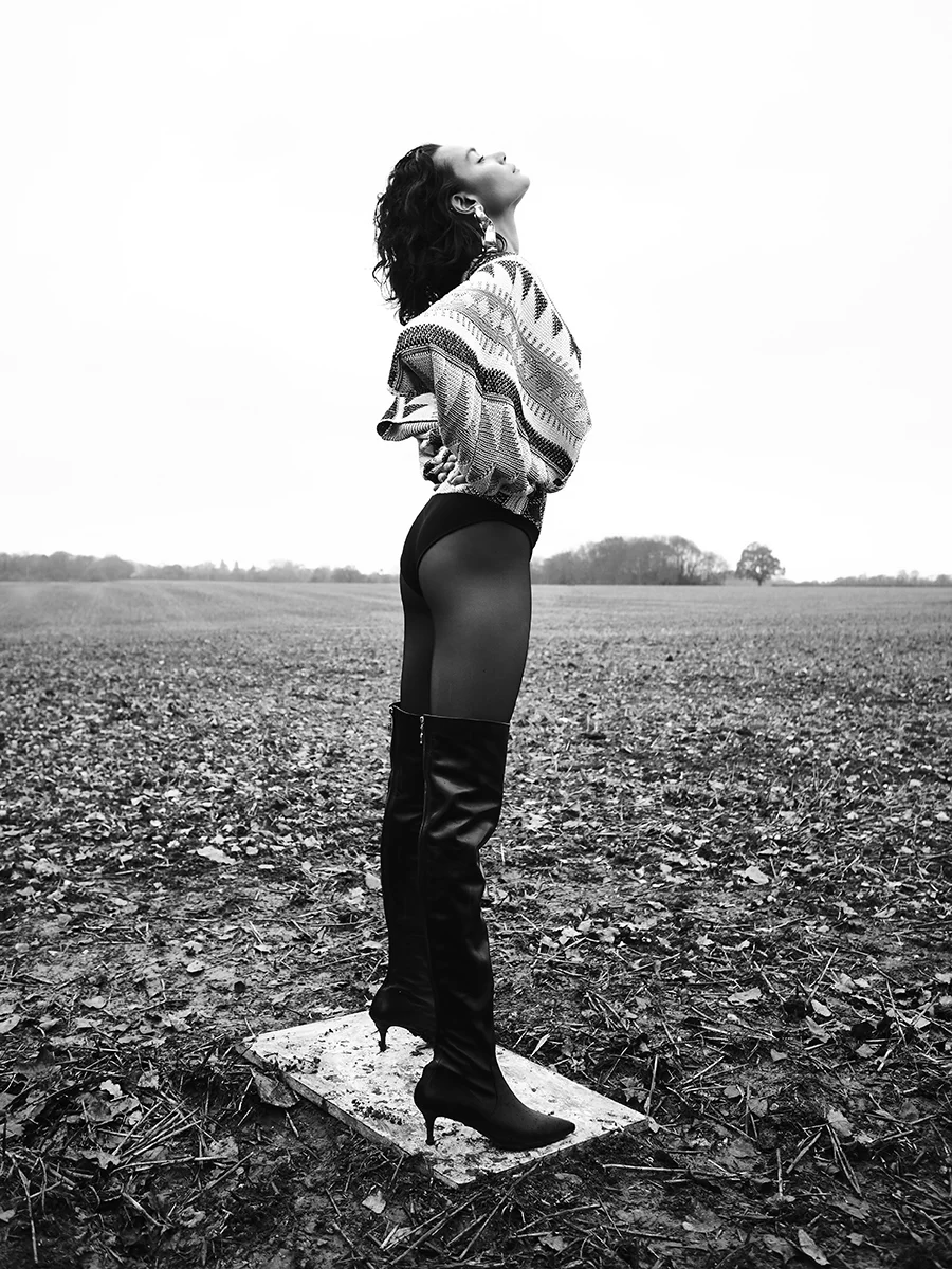 Bodysuit: Louis Vuitton / Boots: Elie Saab / Tights: Wolford / Earrings: Louise Olsen x Alex and Trahanas