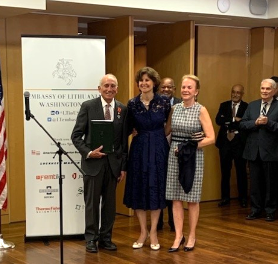 BACC member and Chairman of BAFF Board of Directors Mr. Kim G. Davis receives the award from the new Lithuanian Ambassador to the US