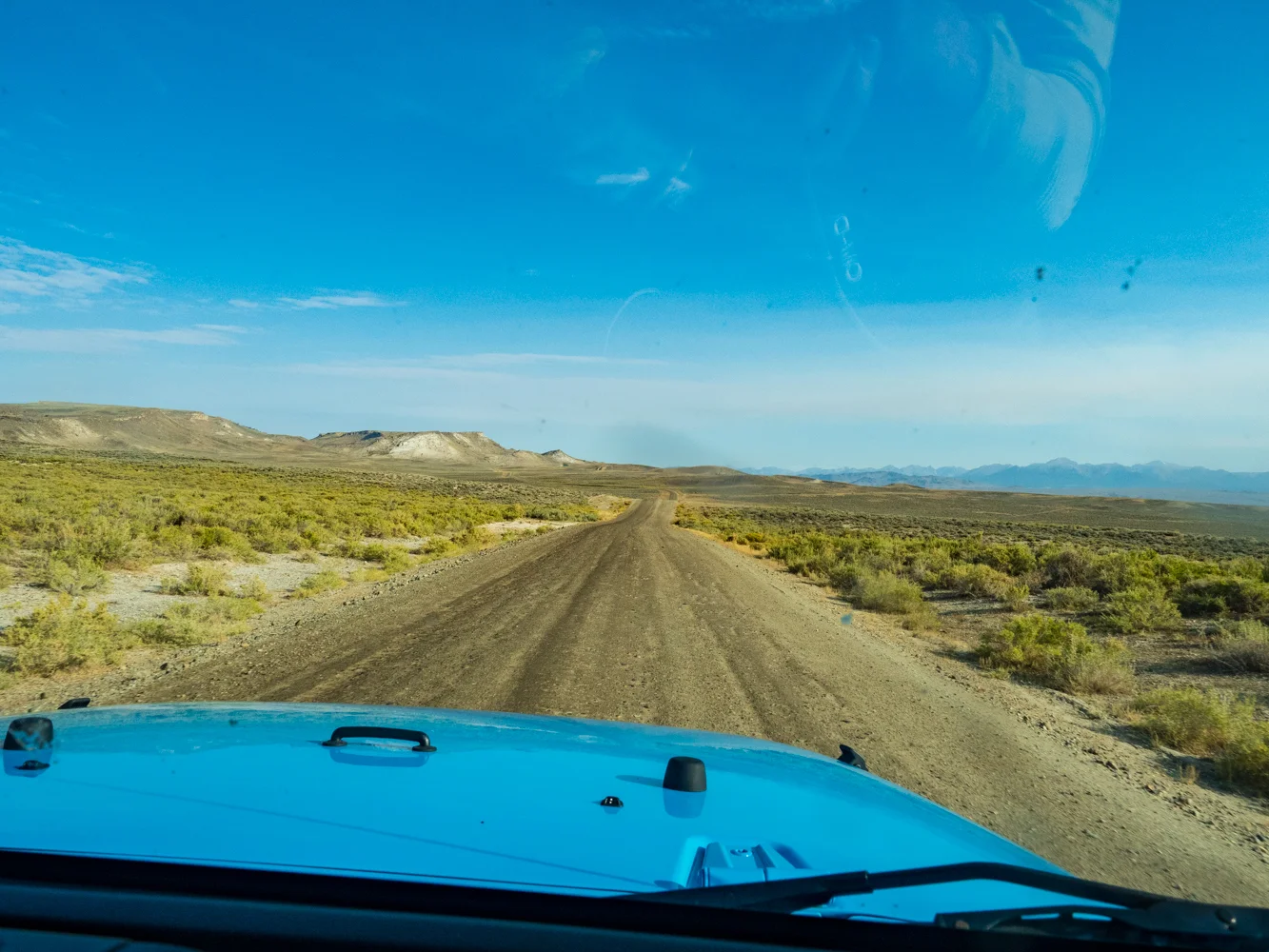 The last 40 miles are all dirt road. We got lucky and were able to rent a brand new Jeep Wrangler! The winds are the mountains in the distance.