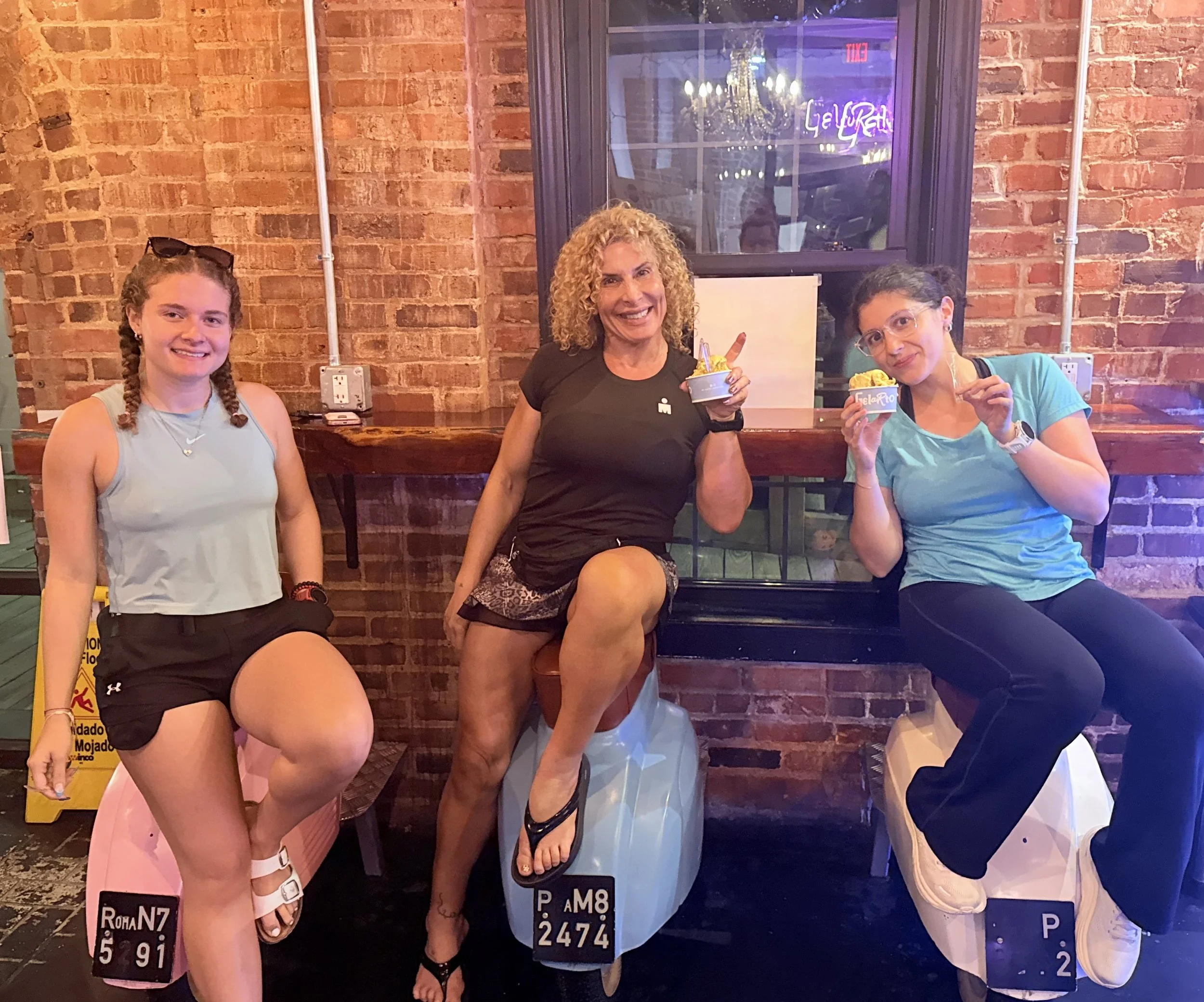 Rosa Laura with daughters Asia and Alessia enjoying gelato during IRONMAN 70.3 North Carolina 2026 race week in Wilmington.