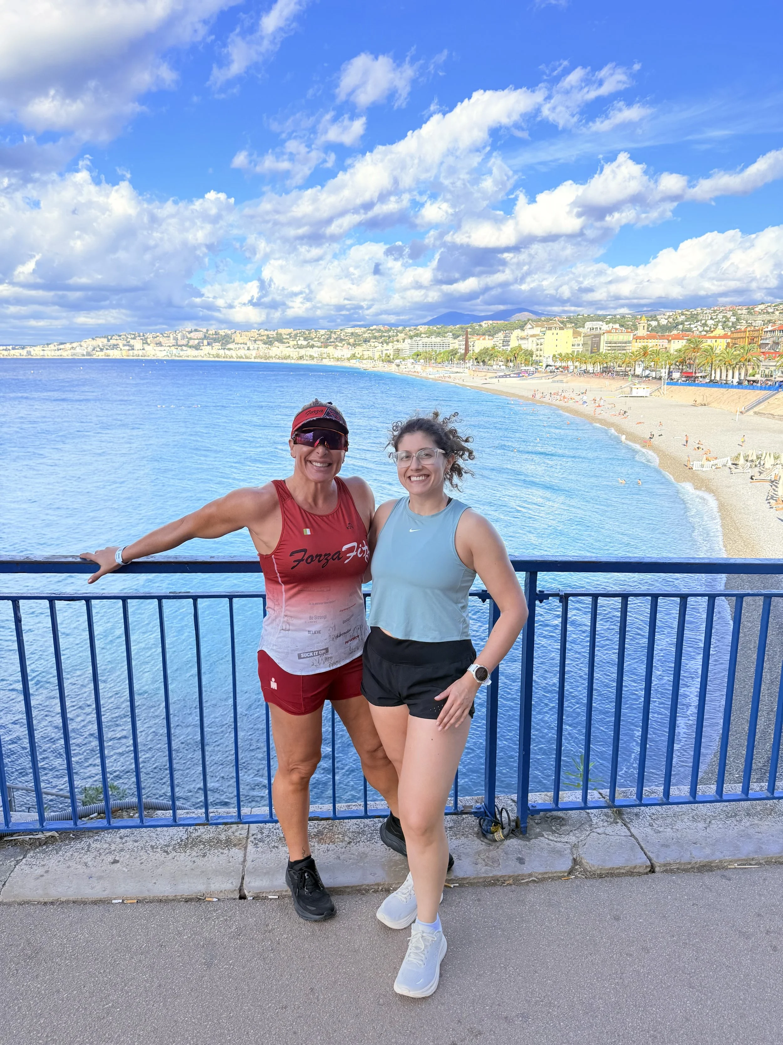 Rosa Laura Saggese Elbooz and her daughter Asia overlooking the Mediterranean Sea and Baie des Anges in Nice, France, during IRONMAN 70.3 World Championship week.